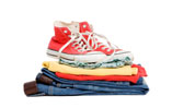 Image of folded clothing and shoes